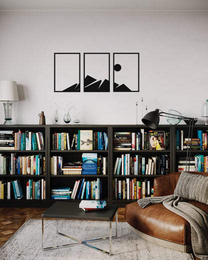 3 pieces wooden wall decoration mountains on a white wall in a library